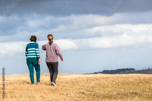 Women Walking Talking Exploring Landscape