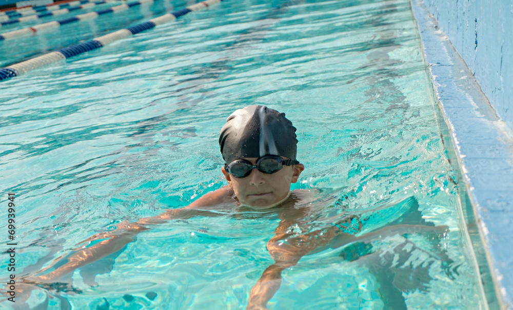 Children swimming and playing in water, happiness and summertime