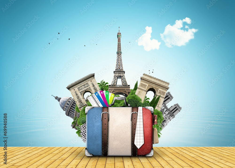 Fototapeta premium France, landmarks Paris, retro suitcase, travel