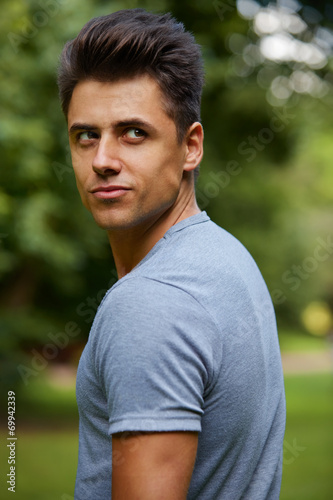 Portrait of a athletic man at summer part
