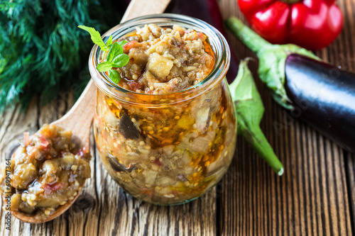 Billede på lærred Eggplant preserve in glass jar