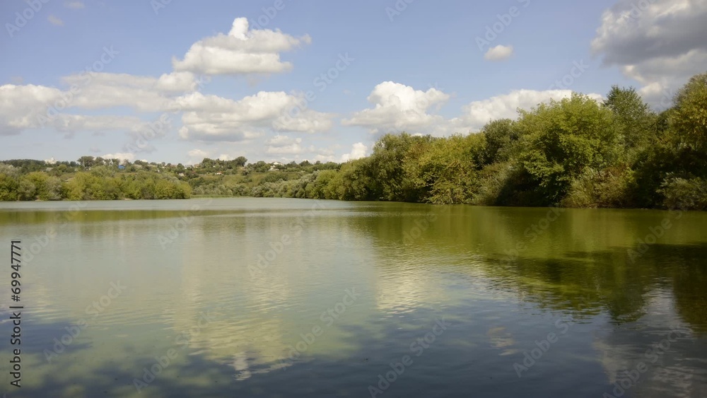 Green lake and clouds time lapse Green lake and clouds time lapse
