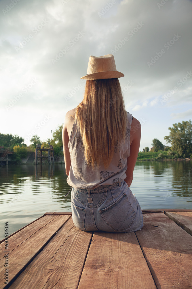Obraz premium Young Girl Enjoying Near River