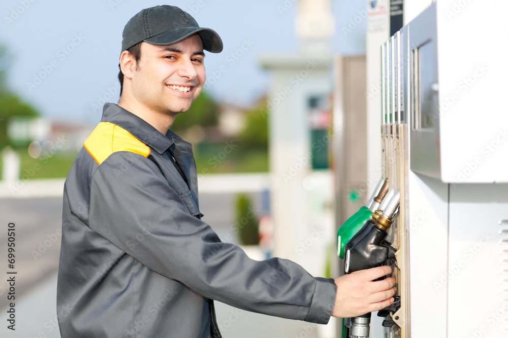 Smiling gas station worker Smiling gas station worker