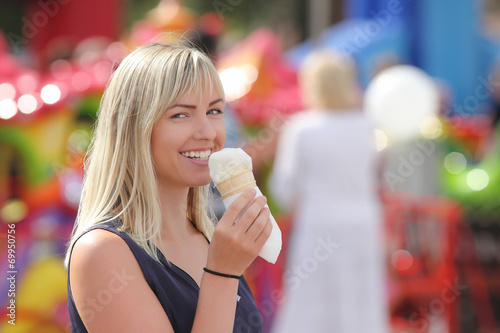 Girl with ice cream on the street