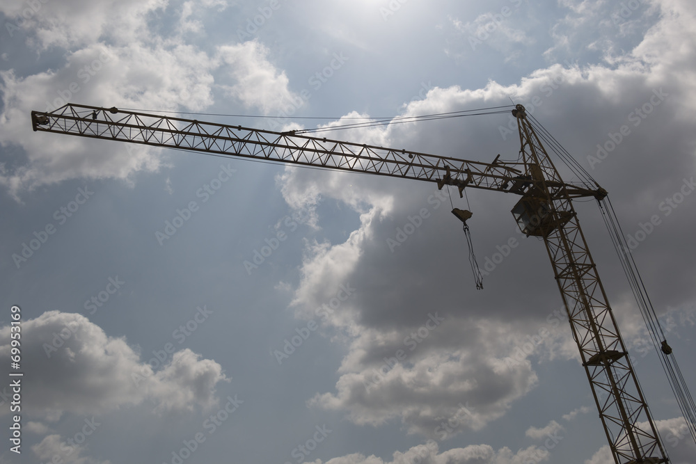 Tower crane in the clouds Tower crane in the clouds