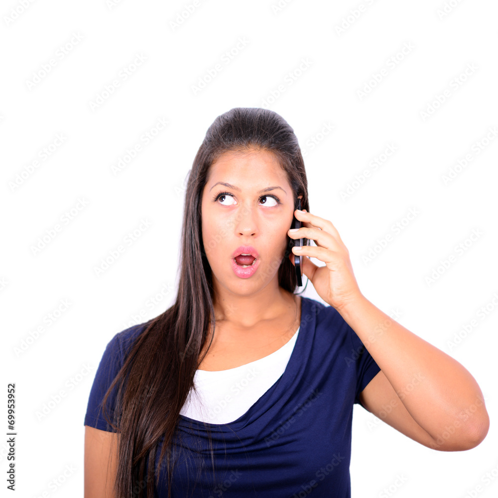 Beautiful woman talking on cellphone and being in shock of news Beautiful woman talking on cellphone and being in shock of news