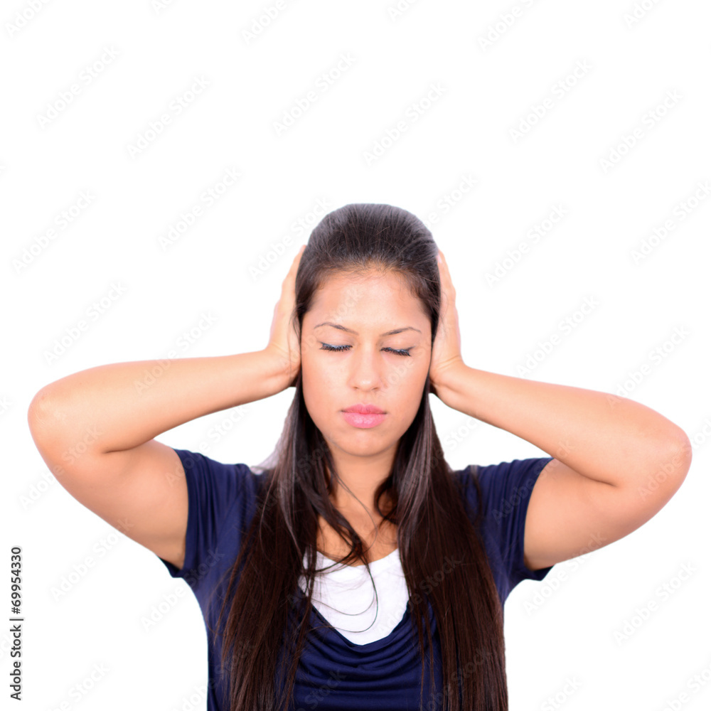 Frustrated woman covering her ears and looking up isolated on wh Frustrated woman covering her ears and looking up isolated on wh