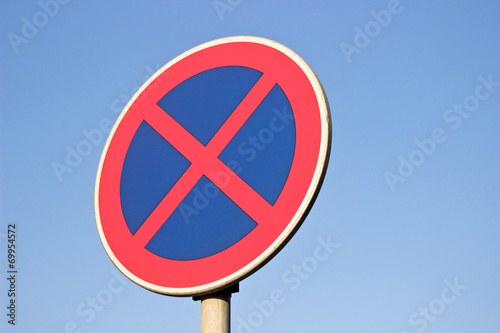 No parking traffic sign over blue sky