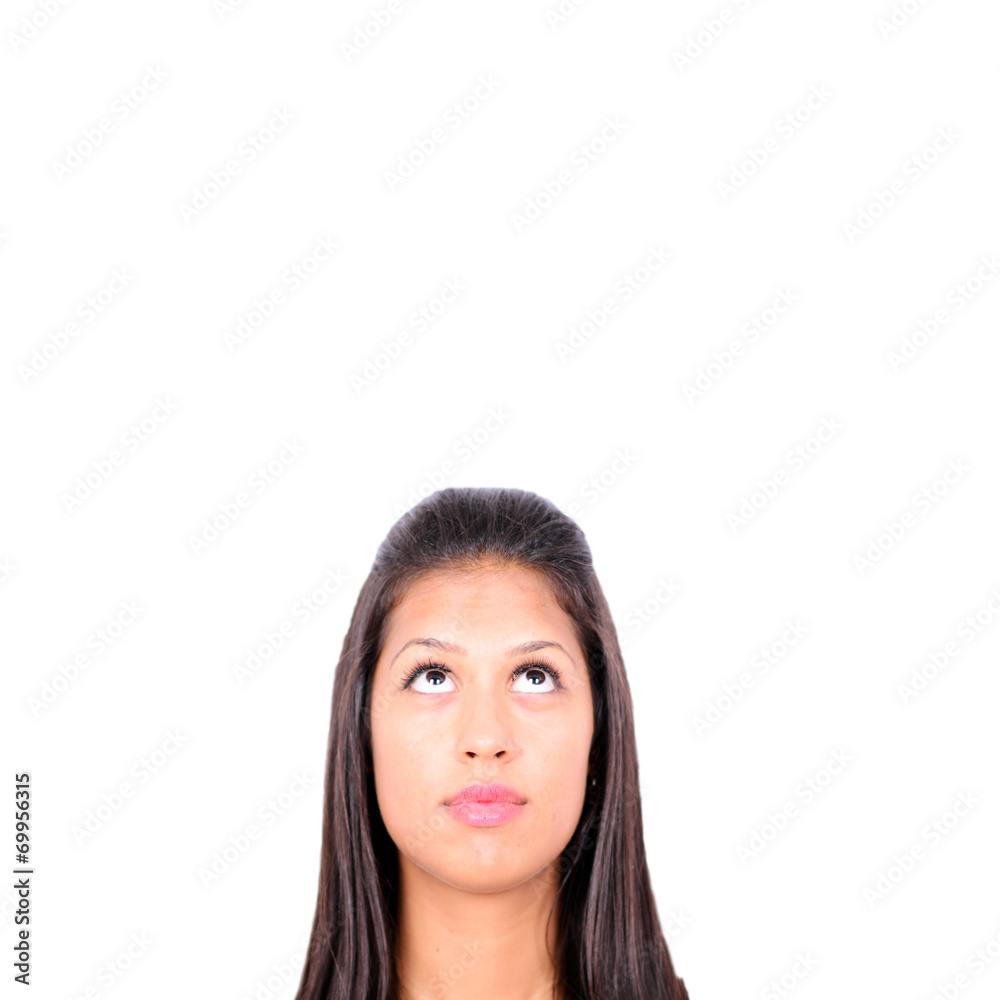 Portrait of young girl with her eyes looking up isolated on whit Portrait of young girl with her eyes looking up isolated on whit