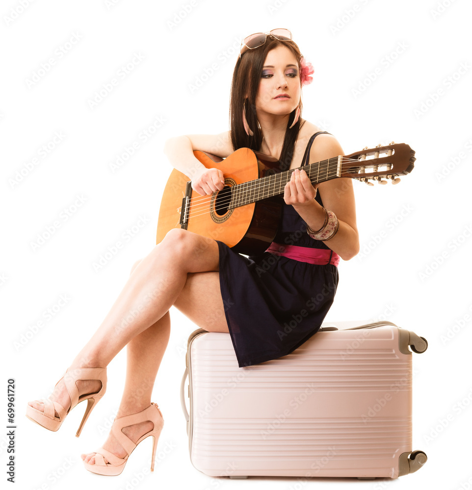 Music lover, summer girl with guitar and suitcase Music lover, summer girl with guitar and suitcase