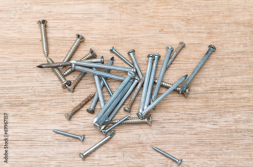 nails on wood background