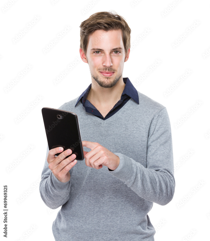 Caucasian man use of digital tablet Caucasian man use of digital tablet