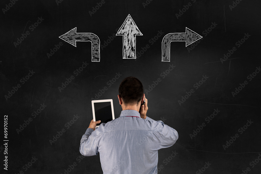 Direction choices and decisions for thoughtful businessman Direction choices and decisions for thoughtful businessman