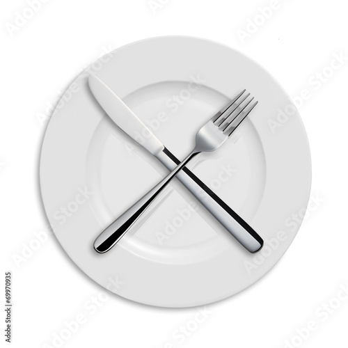 Dinner plate, knife and fork on white background