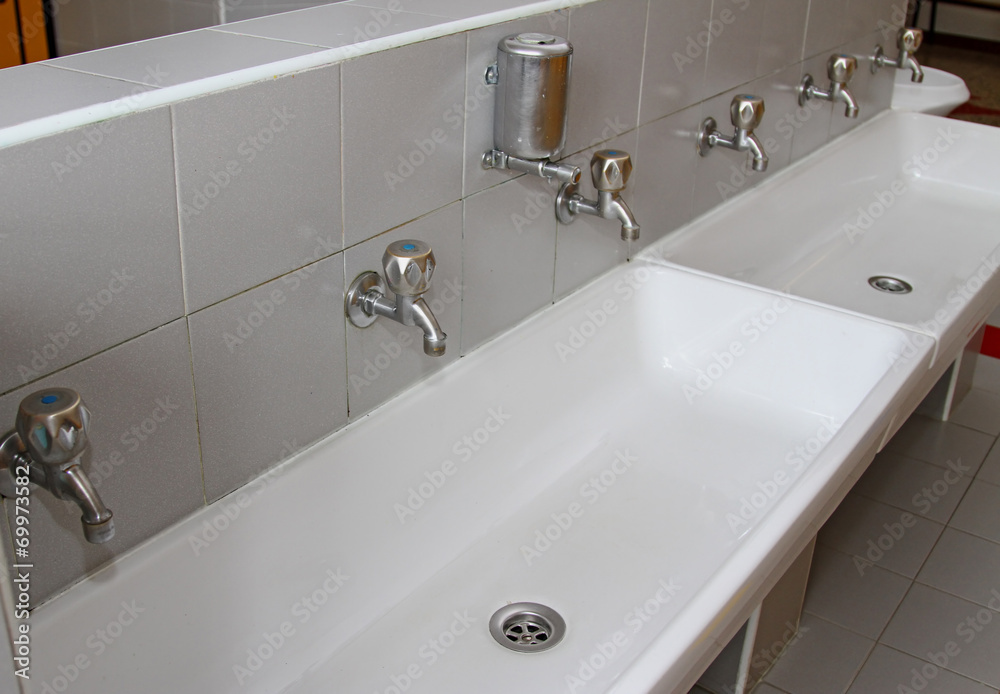 sinks and washbasins with taps in the toilets of a nursery sinks and washbasins with taps in the toilets of a nursery