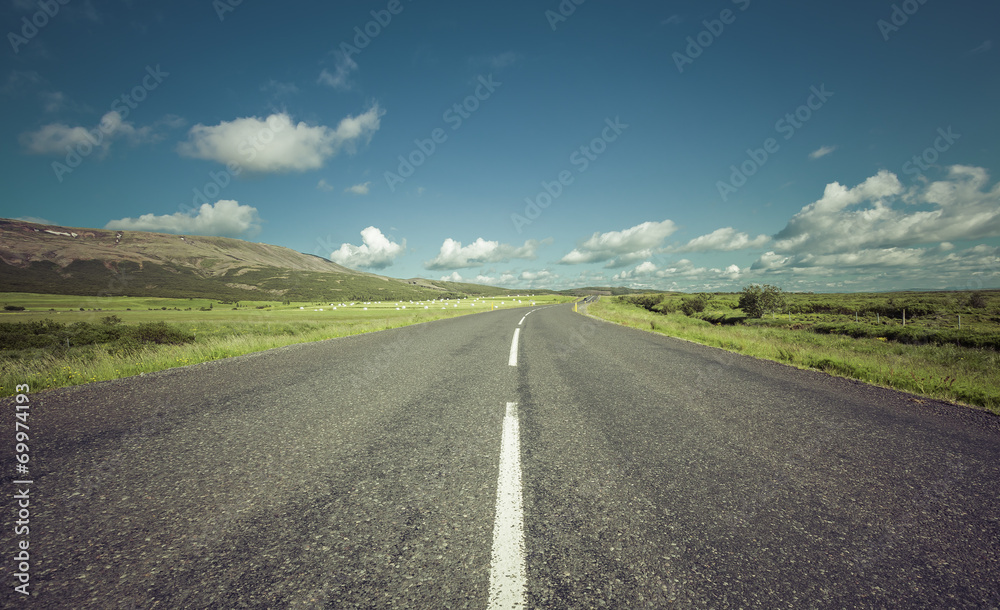 Asphalt road in the mountains of Iceland