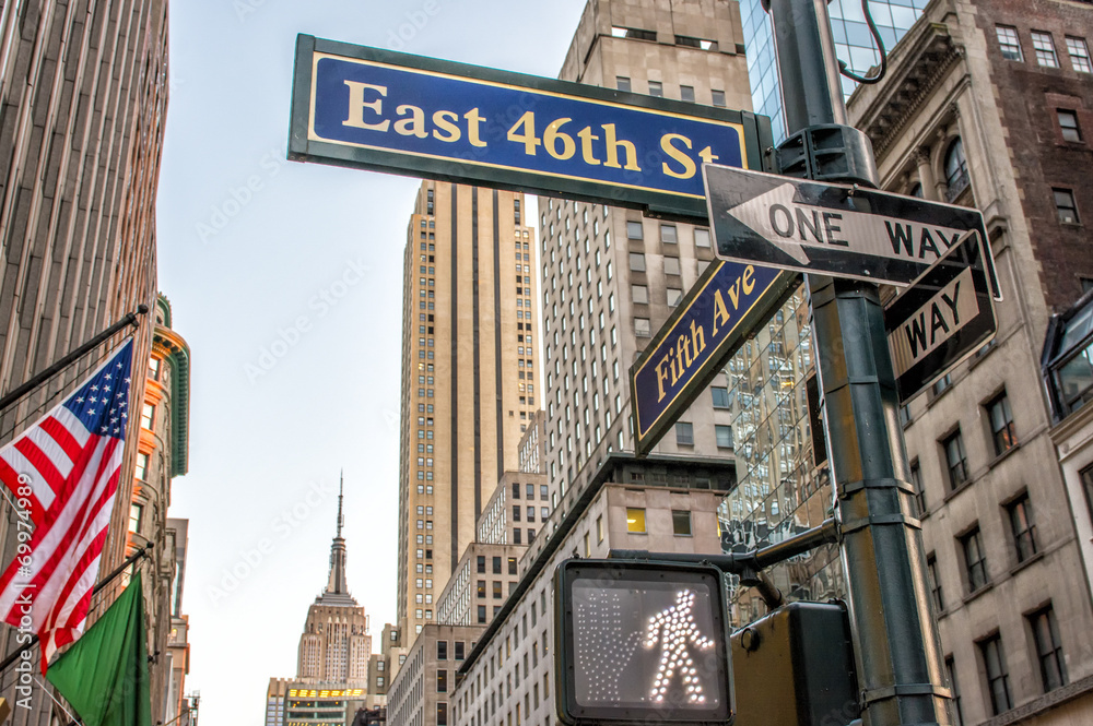 Fifth Avenue street signs and buildings StockFoto Adobe Stock