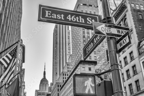 Fifth Avenue street signs and buildings #69975198