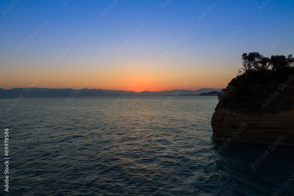 Beautiful sunrise on the beach in Corfu
