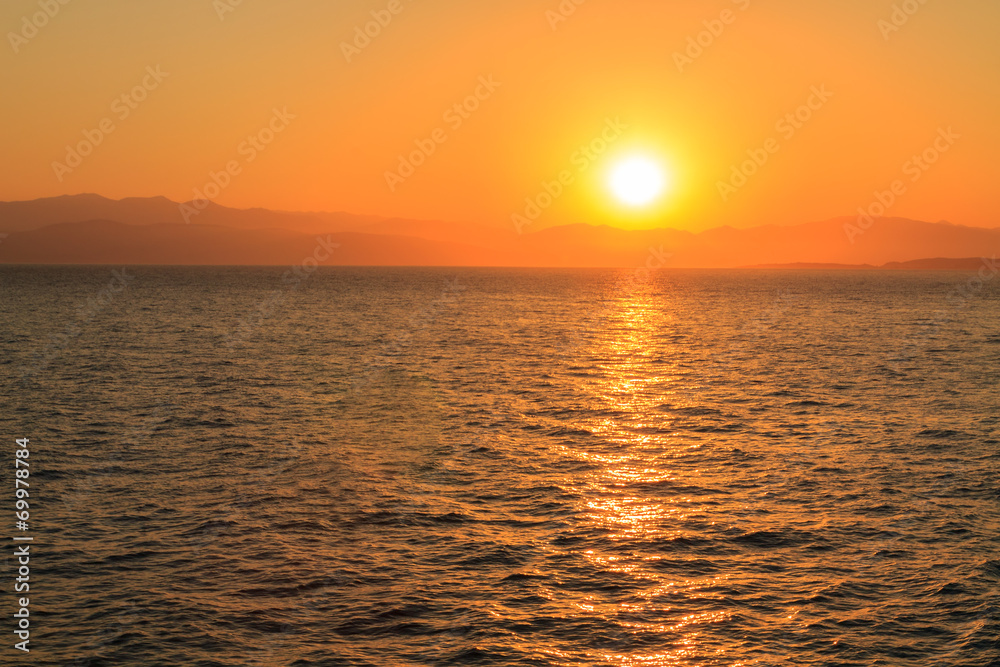 Fototapeta premium Beautiful sunrise on the beach in Corfu