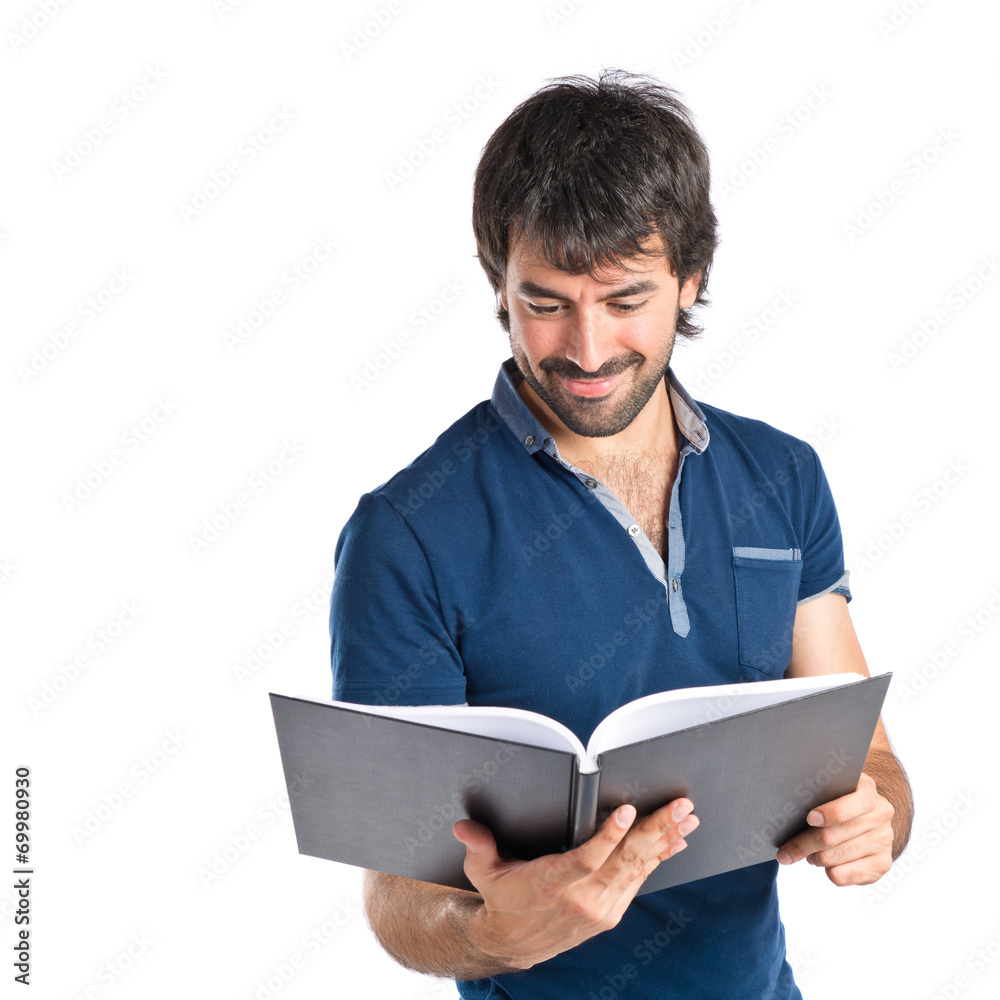 Man reading a book over white background Man reading a book over white background
