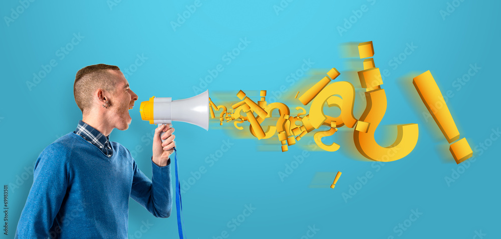 Redhead man shouting by megaphone over blue background.