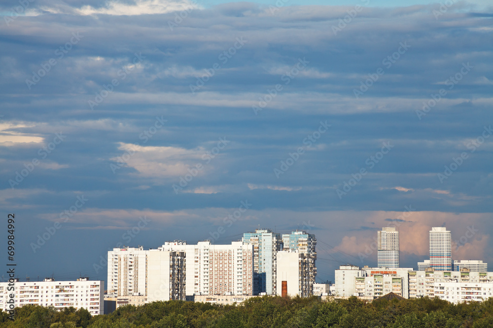 blue rainy clouds over residential area blue rainy clouds over residential area
