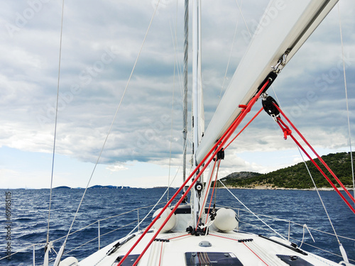 voyage on yacht in Adriatic sea over rainy clouds