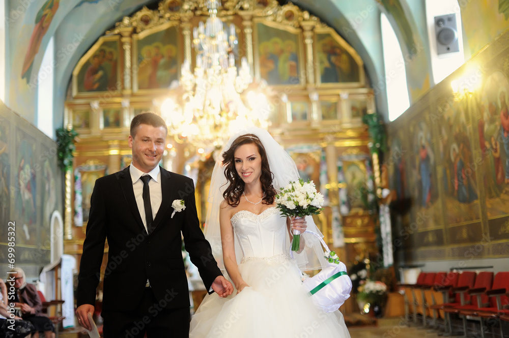 Fototapeta premium bride and groom in the church