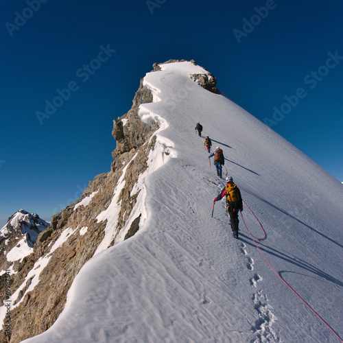 Fotografie, Obraz Climbing a mountain