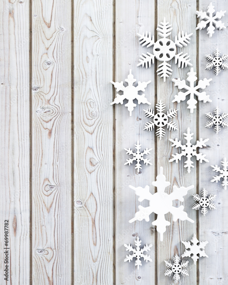 snowflakes on wooden floor winter background snowflakes on wooden floor winter background