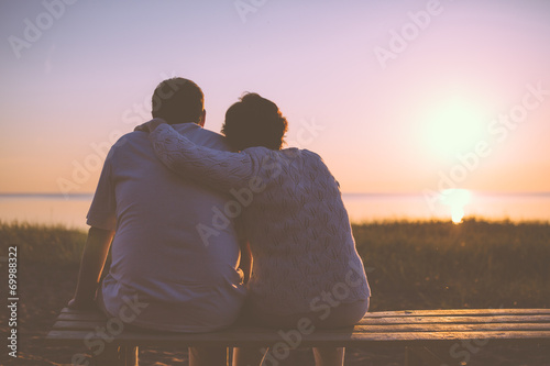 Senior couple enjoy the sunset together