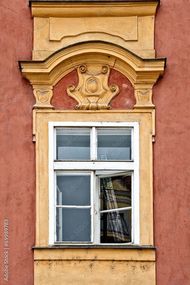 Fototapeta premium Window with pediment in Prague, Czech Republic