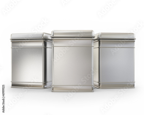 three blank metal boxes with caps isolated on white photo