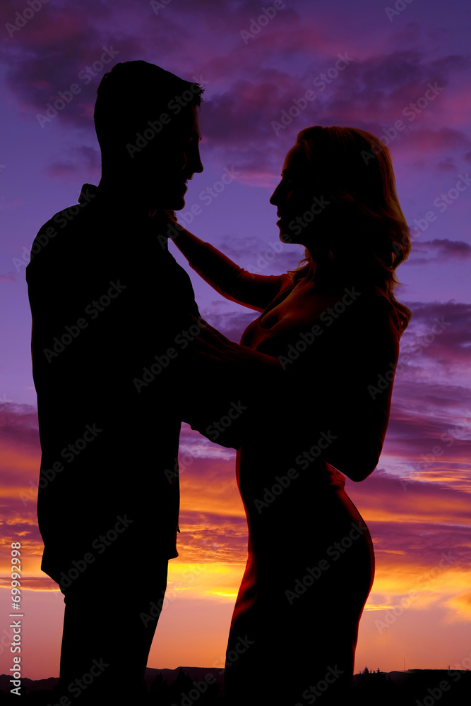 silhouette couple dancing together