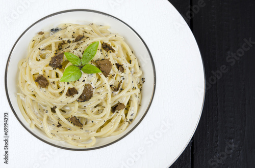 Spaghetti with fresh black truffle photo