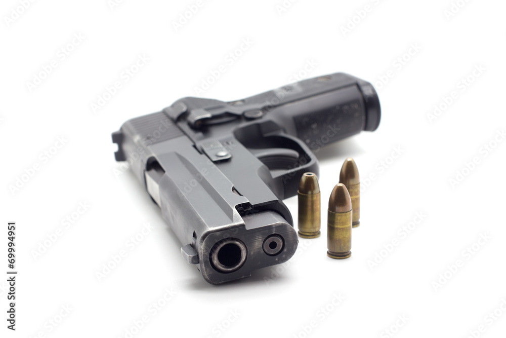 Gun with ammunition on white background