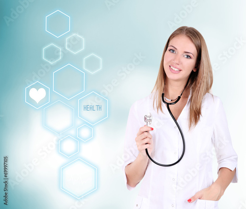 Young beautiful doctor on b...