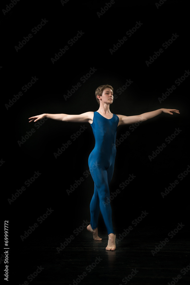 young ballet dancer dansing on white background