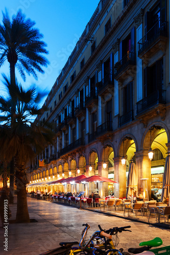 Placa Reial with restaurants in evening. Barcelona