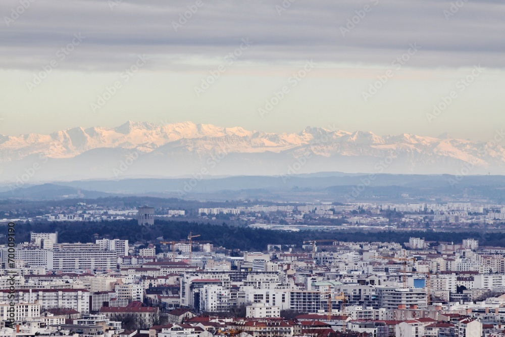 View of the city of Lyon with Alps mountains