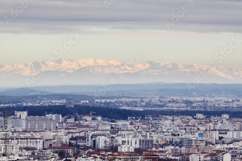 View of the city of Lyon with Alps mountains