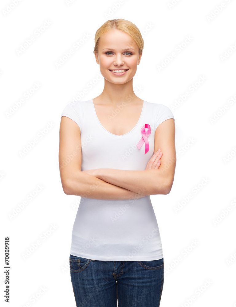 smiling woman with pink cancer awareness ribbon smiling woman with pink cancer awareness ribbon