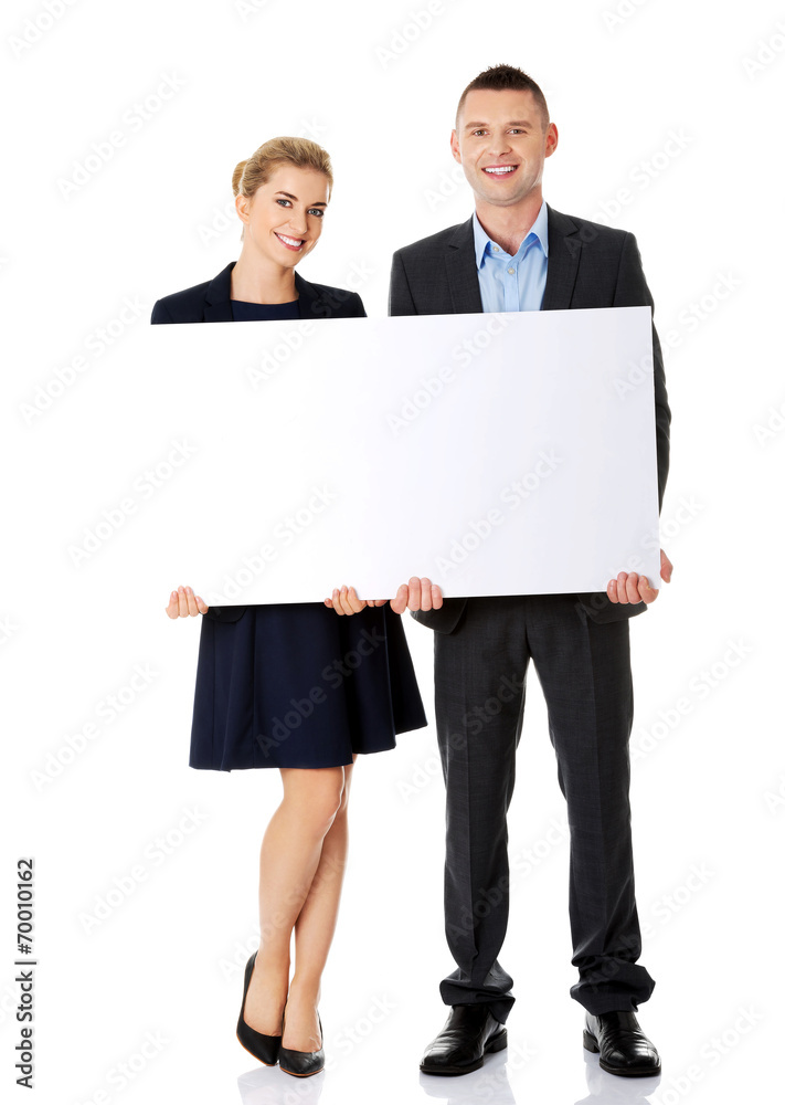 Business team with a banner Business team with a banner