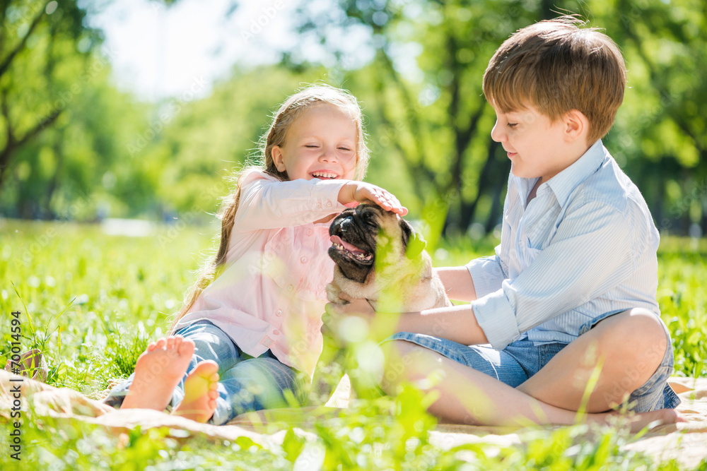 Children in park with pet Children in park with pet