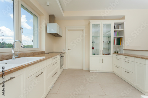 Modern white kitchen with granite tops
