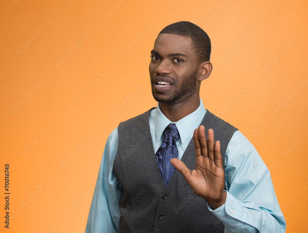 Stop hand gesture. Annoyed young man with hands up Photos