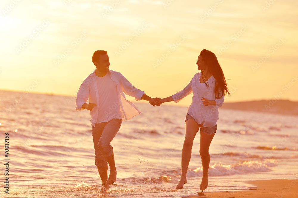 young couple  on beach have fun