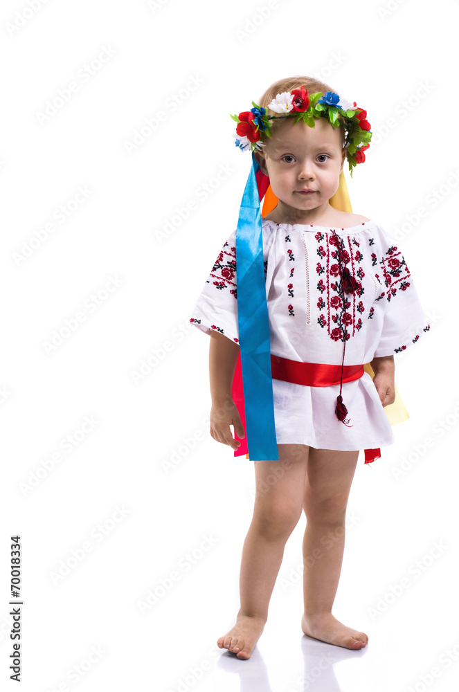 Little girl in the Ukrainian national clothes isolated on white Little girl in the Ukrainian national clothes isolated on white